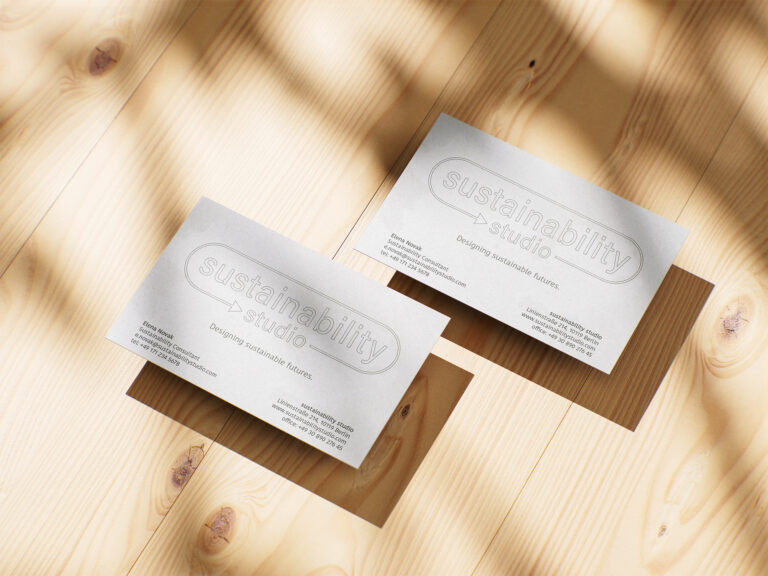 A sustainable-themed business card featuring eco-friendly design elements, earthy colors, and minimalist layout.
